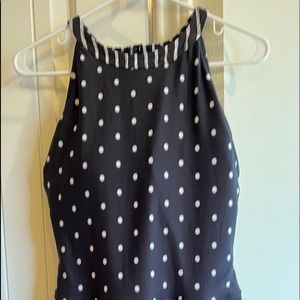 Swimsuit/ swim skirt with built in bottoms.  
NEVER WORN